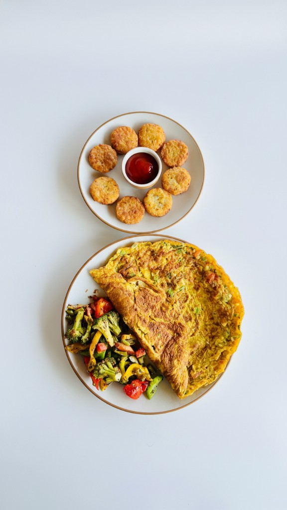 Breakfast spread with omelette and sides